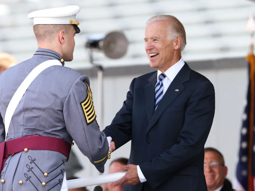 A diploma or certificate being presented